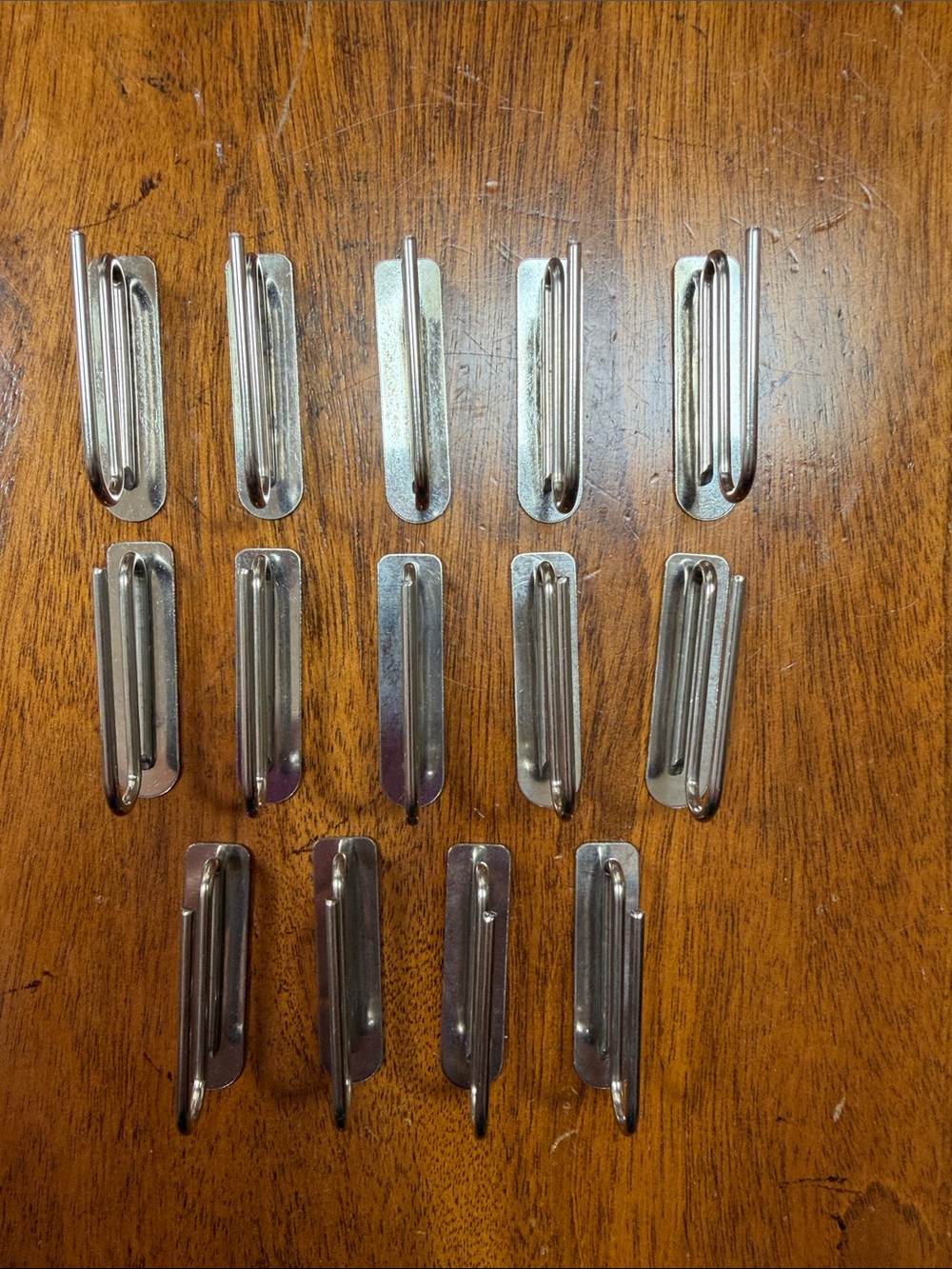 Pottery Barn metal curtain clips, drapery hooks, set of 14, new, never used.